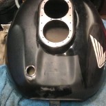 Cut hole in Fireblade Fuel tank to fit new type breather.