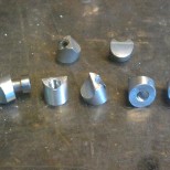 Make clamp parts, no two sides the same. 