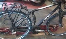 Bike with top broken off saddle tube of frame.