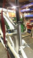 Gas damper will allow for raising and lowering of saddle by button.
