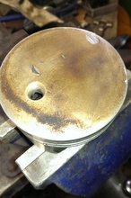 Mercedes Piston Valve punched a hole in it.