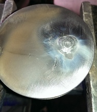 Weld piston top. 